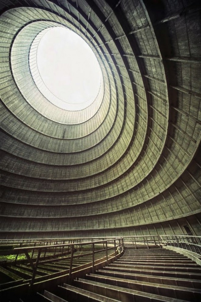 A cooling tower in an abandoned factory.