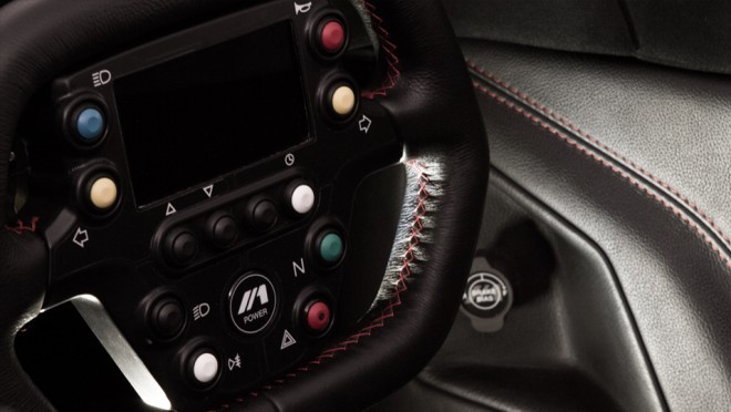 The interior gives the driver a very sporty feel, including an F1-like steering wheel and paddle shifters on the steering wheel. 