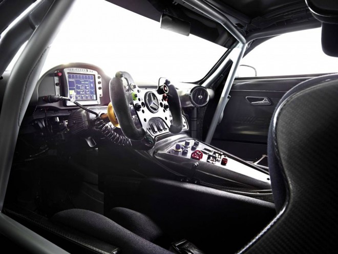 The interior is uncompromisingly racing, with carbon bucket seats, a roll cage, a racing steering wheel and a sequential gearbox.