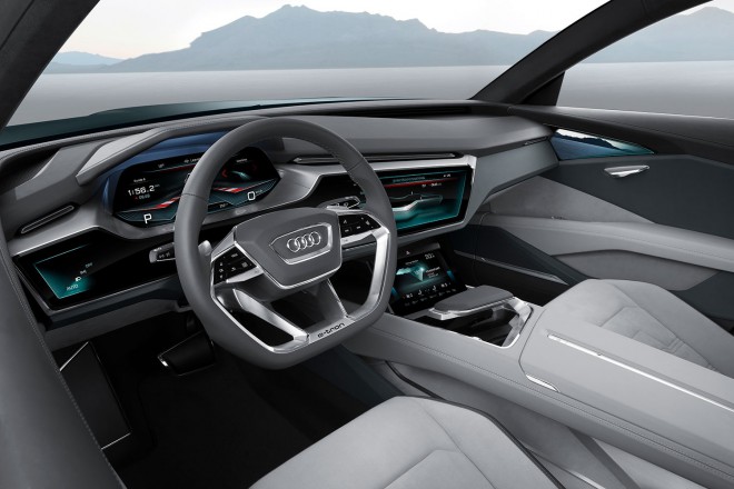 Audi into the future with a futuristic dashboard and a touch-sensitive steering wheel.