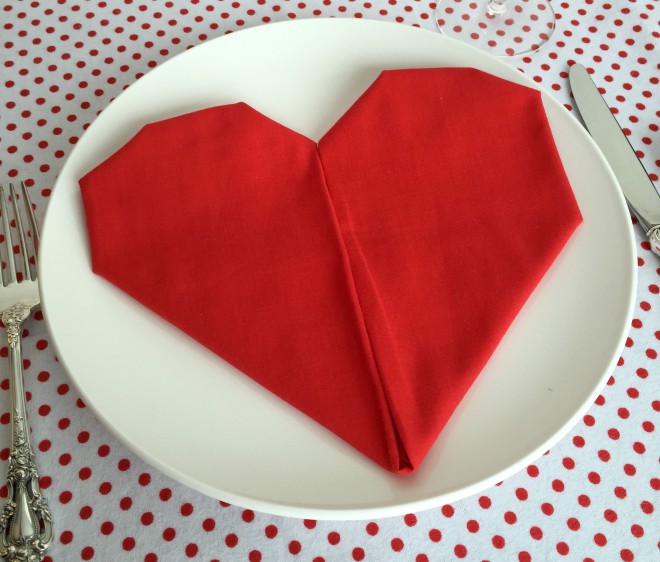 Napkin in the shape of a heart.