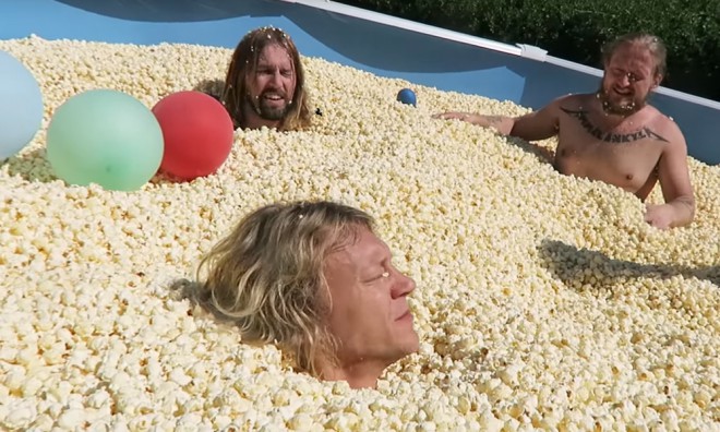 A pool filled with popcorn can be a good addition to the party.