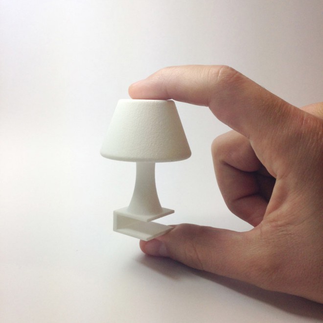 Se på denne "søde", lille lampe, der begynder at arbejde i kontakt med din smartphone. 