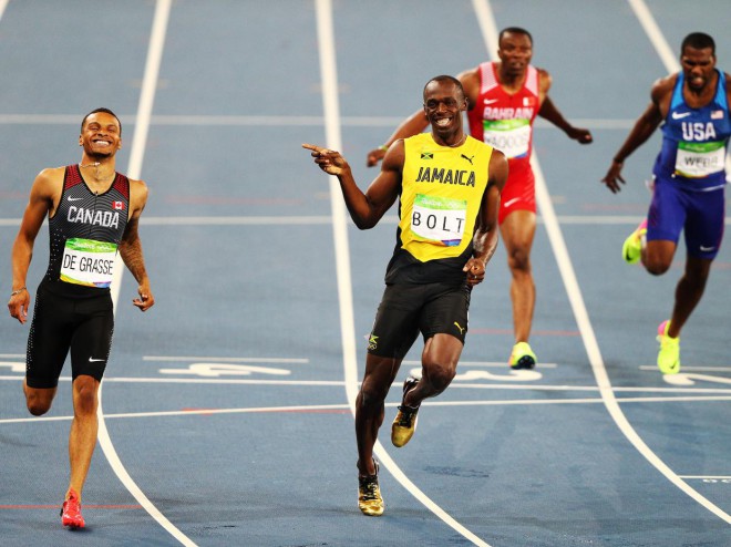 Bromanca v Riu. Usain Bolt in Kanadčan Andre De Grasse v polfinalu teka na 200 metrov.