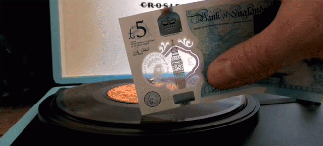 Plastic money as a gramophone needle.