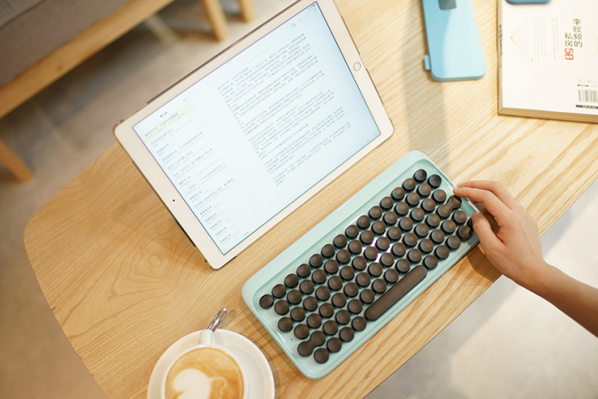 The Lofree keyboard offers an authentic typewriter typing experience.